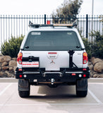 MCC REAR WHEEL CARRIER BAR WITH SINGLE JERRY CAN HOLDER FOR MITSUBISHI TRITON 06-09