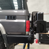 MCC REAR WHEEL CARRIER BAR WITH DUAL JERRY CAN HOLDERS FOR TOYOTA LAND CRUISER 84-07
