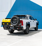 MCC REAR WHEEL CARRIER BAR WITH DUAL JERRY CAN HOLDERS FOR MITSUBISHI TRITON 24-ON