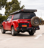 MCC REAR WHEEL CARRIER BAR WITH DUAL JERRY CAN HOLDERS FOR NISSAN NAVARA 15-20