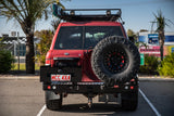 MCC REAR WHEEL CARRIER BAR WITH DUAL JERRY CAN HOLDERS FOR NISSAN PATROL 97-05