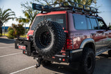 MCC REAR WHEEL CARRIER BAR WITH DUAL JERRY CAN HOLDERS FOR NISSAN PATROL 97-05