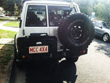 MCC REAR WHEEL CARRIER BAR WITH DUAL JERRY CAN HOLDERS FOR NISSAN PATROL 87-97